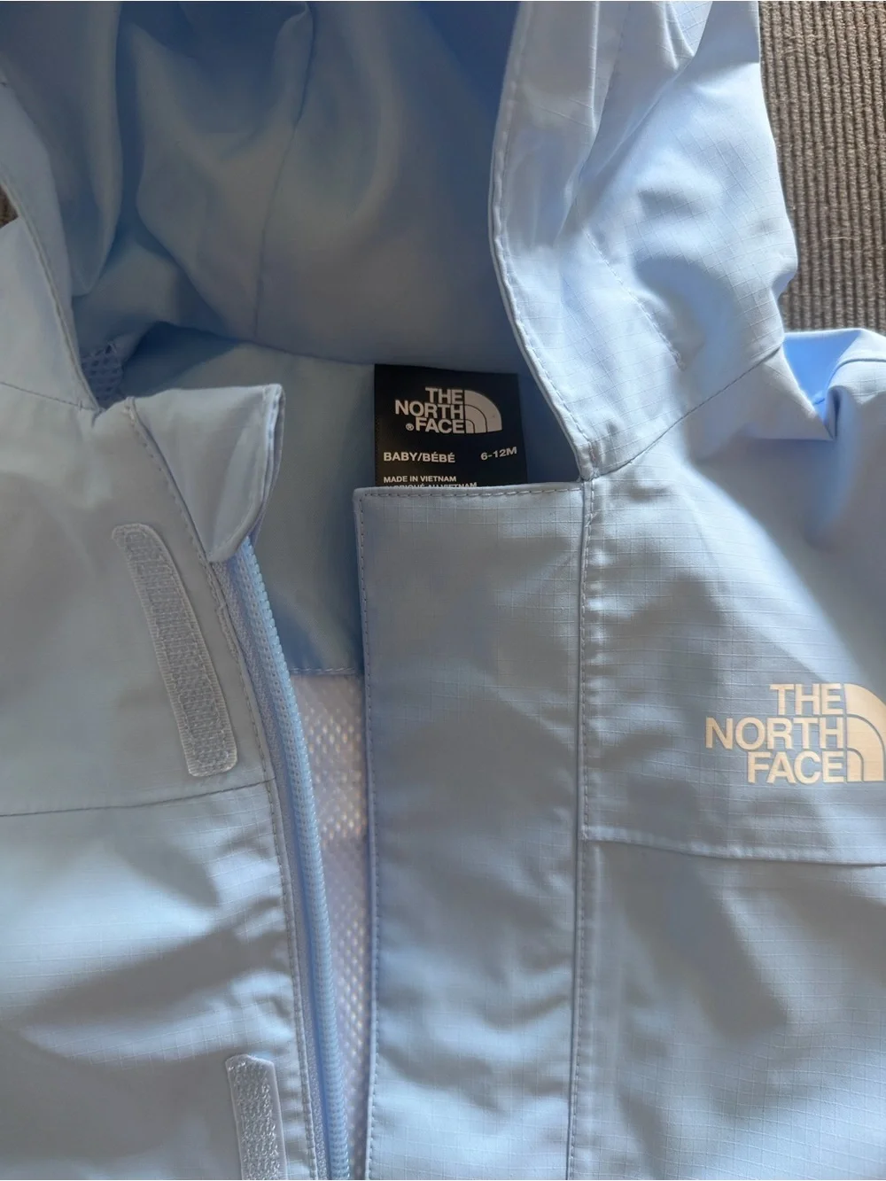 The North Face Pale Blue Kids Hooded Rain Jacket 6-12 months